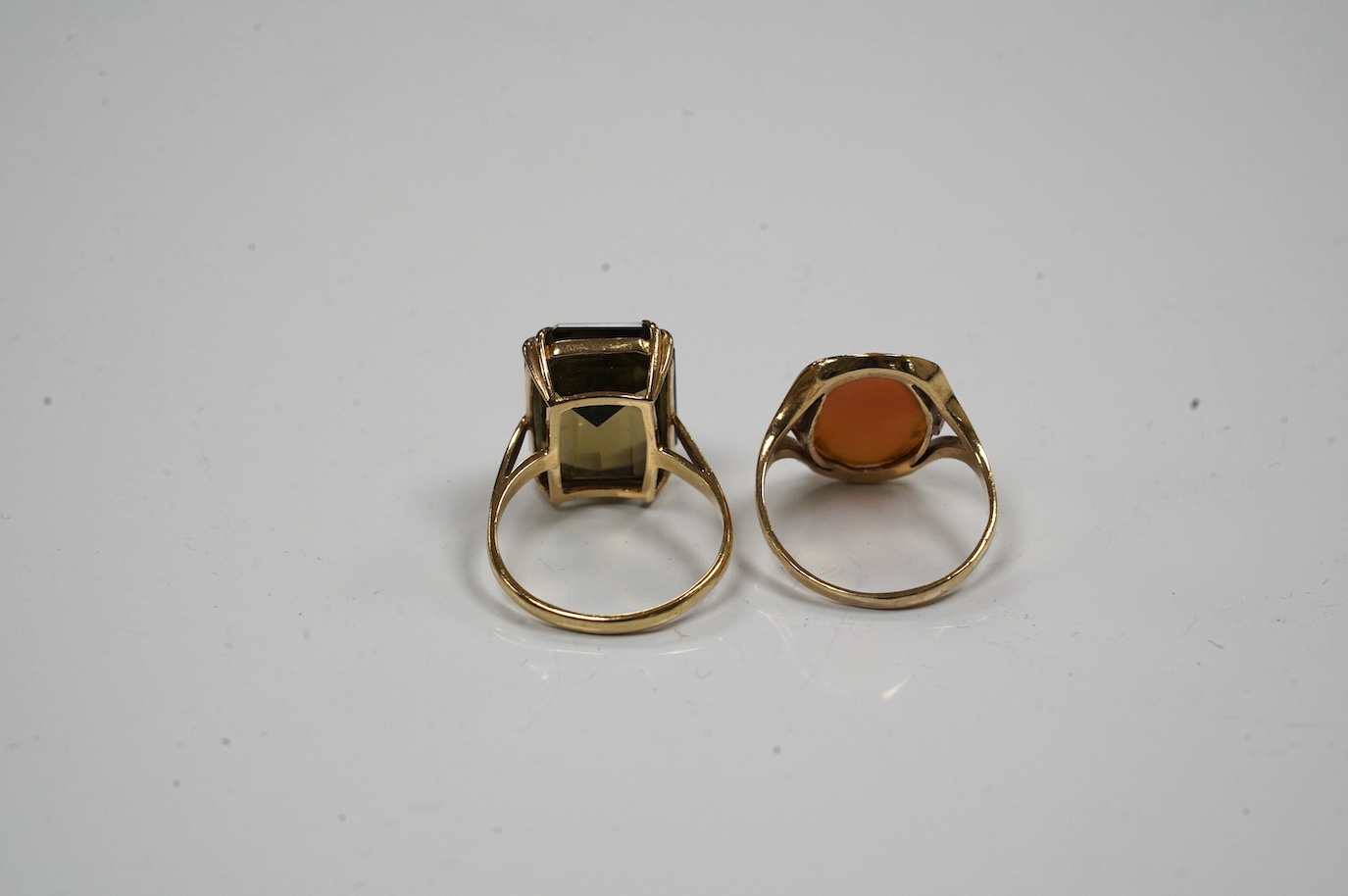 Two 9ct gold and gem set rings to include citrine and cameo shell, gross weight 8.6 grams. Condition - fair to good